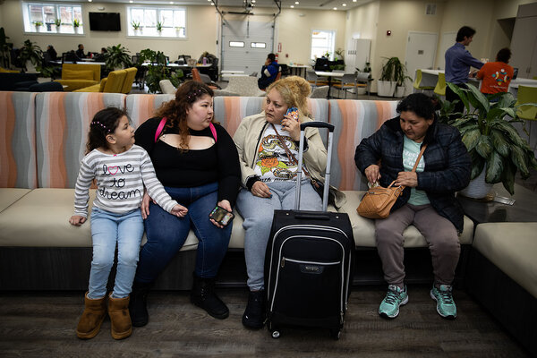 People wait their turn for help at La Colaborativa, in Chelsea, Massachusetts, March 16, 2025. La Colaborativa is a nonprofit offering support to the Latino community such as help learning English and with employment training, immigration questions, housing assistance, and health care referrals.